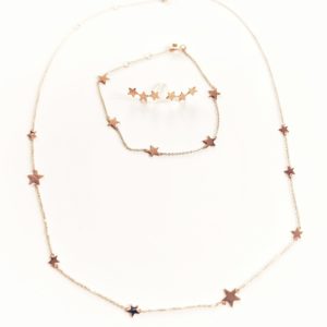 14k rose gold matching necklace, bracelet, and climber earring set.